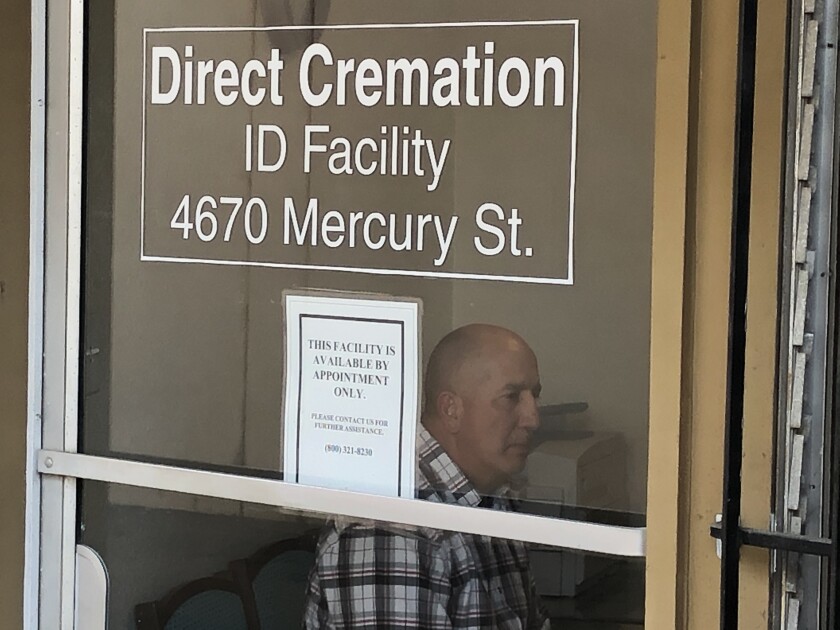 Michael Serna waits inside a Kearny Mesa crematory Thursday as his wife said her last goodbye to their oldest daughter. Elisa Serna was 24 when she died Monday in San Diego County jail.