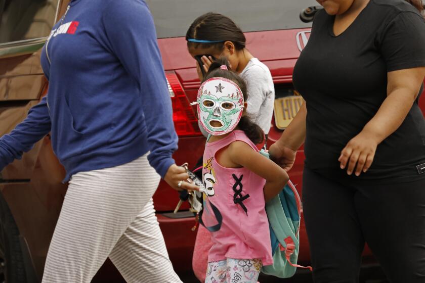 HARLEM, NEW YORK--JUNE 27, 2018-- Children are taken to the Cayuga Centers in East Harlem. Hundreds of migrant children separated from their parents by federal immigration officials are being cared for in the facility. Carolyn Cole / Los Angeles Times