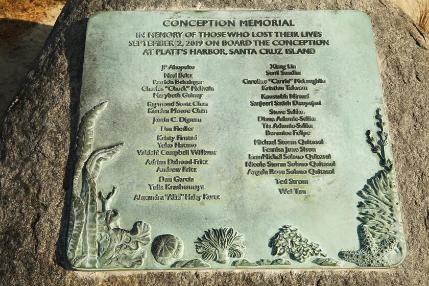 SANTA BARBARA , CA - SEPTEMBER 02: Early Wednesday morning family members with friends and officials gathered at Point Castillo at the end of Harbor Walk in the Santa Barbara Harbor where a plaque on a boulder was unveiled to memorialize the 34 lives lost in the Conception Diving Boat fire off Santa Cruz Island on the one year anniversary. Santa Barbara Harbor on Wednesday, Sept. 2, 2020 in Santa Barbara , CA. (Al Seib / Los Angeles Times