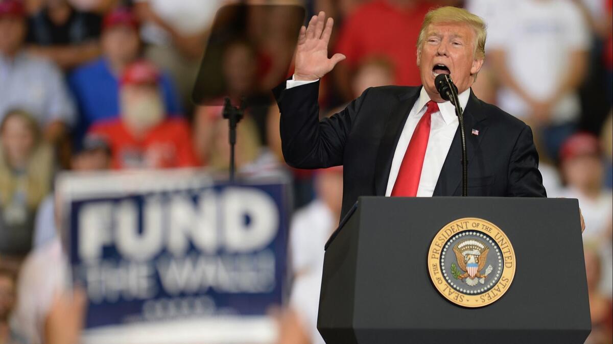 President Trump speaks at a campaign rally in Evansville, Ind., on Aug. 30.