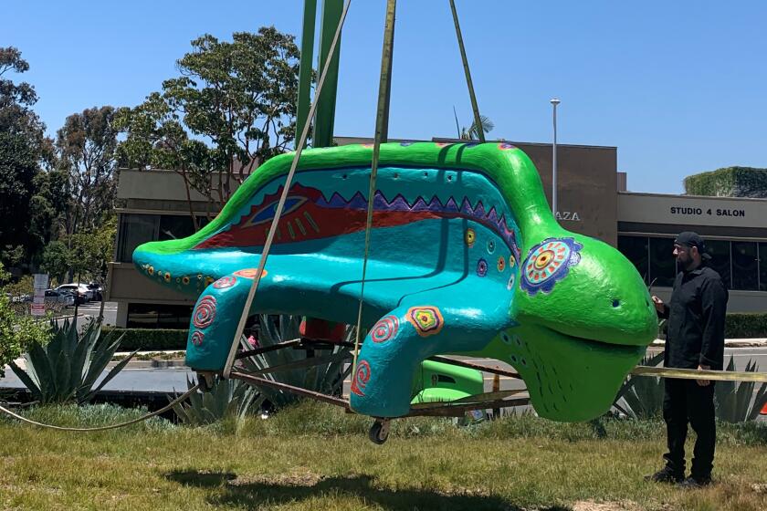 'Gecko,' by artist Doug Snider is installed as part of the city's revolving sculpture garden.