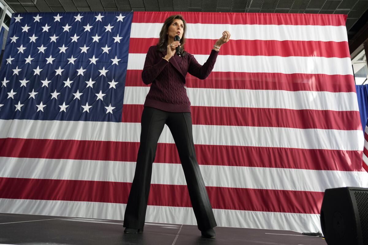 Nikki Haley speaks in front of a U.S. flag.