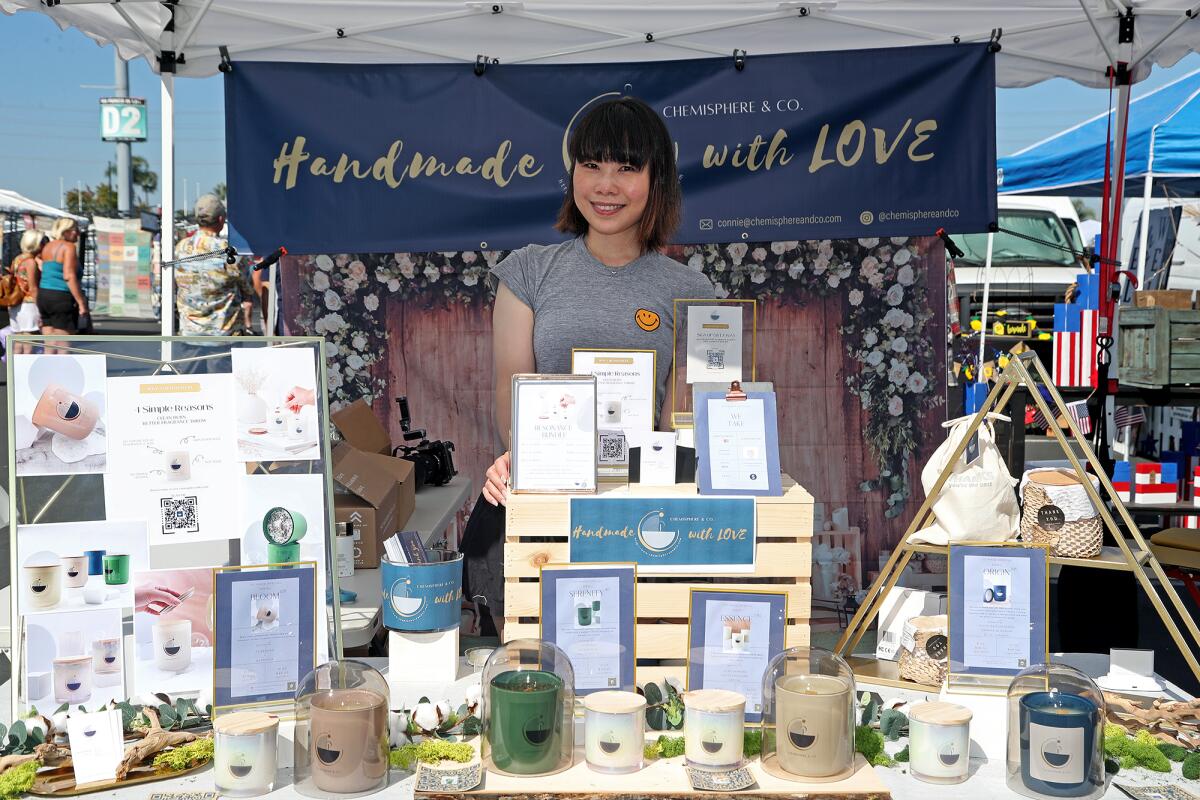 Chemisphere & Co. owner Connie Chiu, 37, of Newport Beach, sells handmade candles and essential oils at the O.C. Swap Meet.