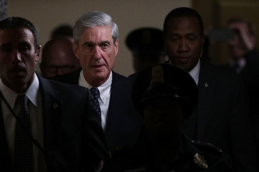 WASHINGTON, DC - JUNE 21: Special counsel Robert Mueller (2nd L) leaves after a closed meeting with members of the Senate Judiciary Committee June 21, 2017 at the Capitol in Washington, DC. The committee meets with Mueller to discuss the firing of former FBI Director James Comey. (Photo by Alex Wong/Getty Images) User Upload Caption: . ** OUTS - ELSENT, FPG - OUTS * NM, PH, VA if sourced by CT, LA or MoD **