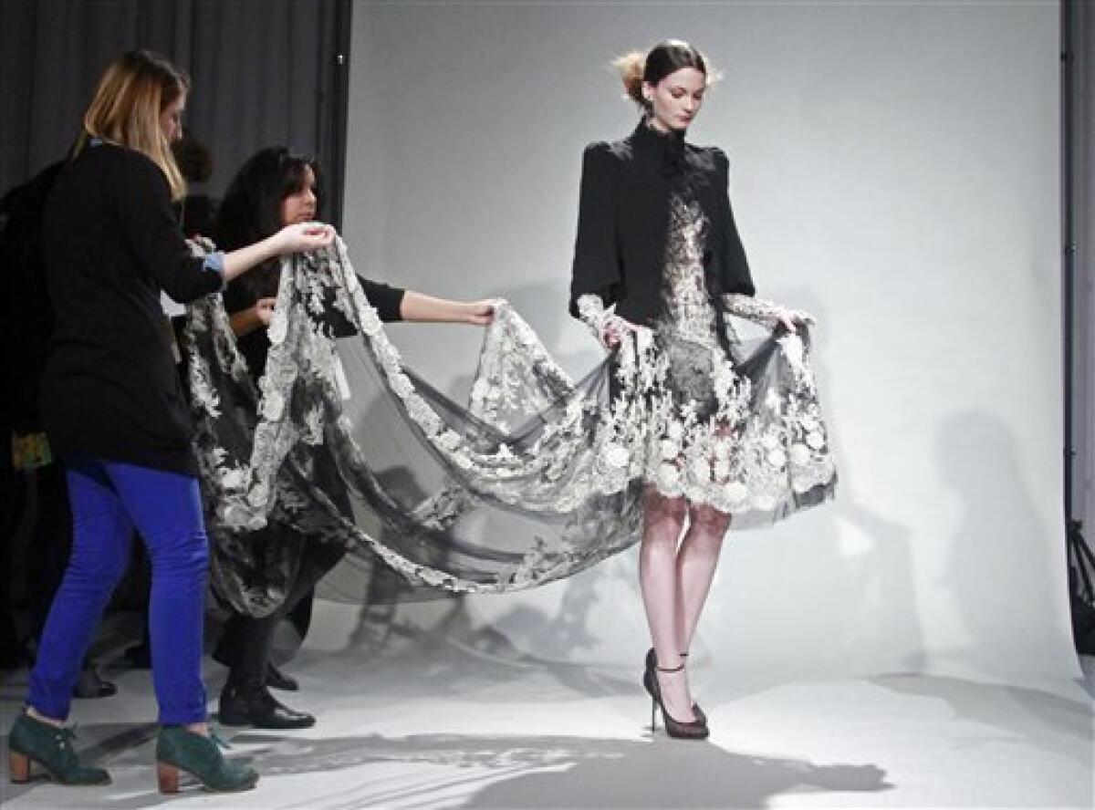A model is prepared for a photo shoot for the Marchesa fall 2011 collection on Wednesday, Feb. 16, 2011 in New York. (AP Photo/Bebeto Matthews)