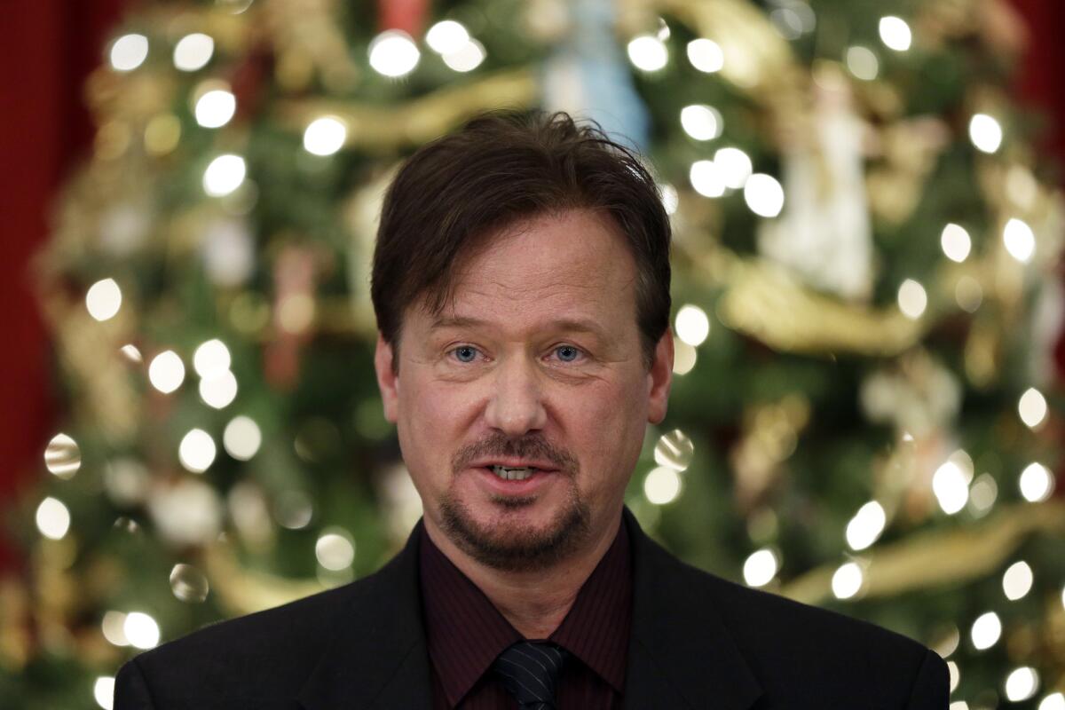 The Rev. Frank Schaefer, a United Methodist clergyman convicted of breaking church law for officiating at his son's same-sex wedding, has been defrocked by the church. Above, Schaefer at a news conference Monday.