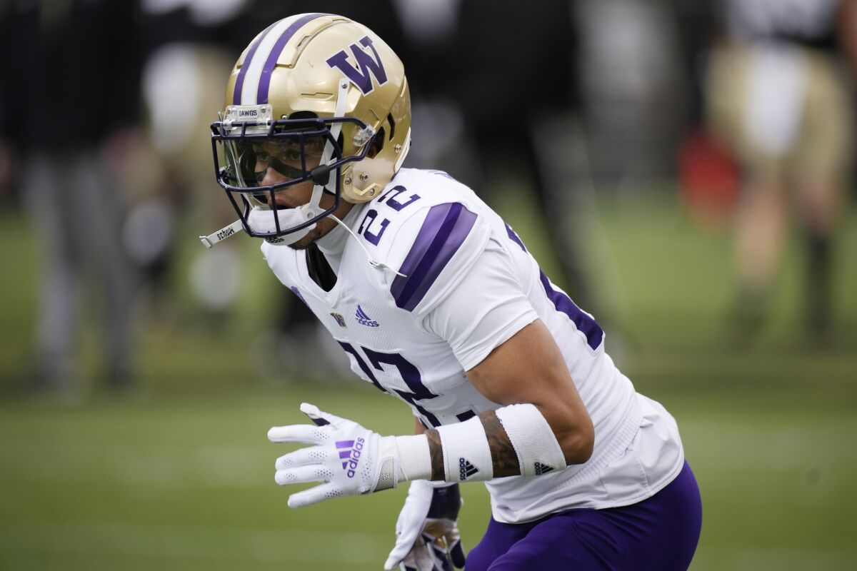 Washington defensive back Trent McDuffie gets ready to defend  against Colorado in November.