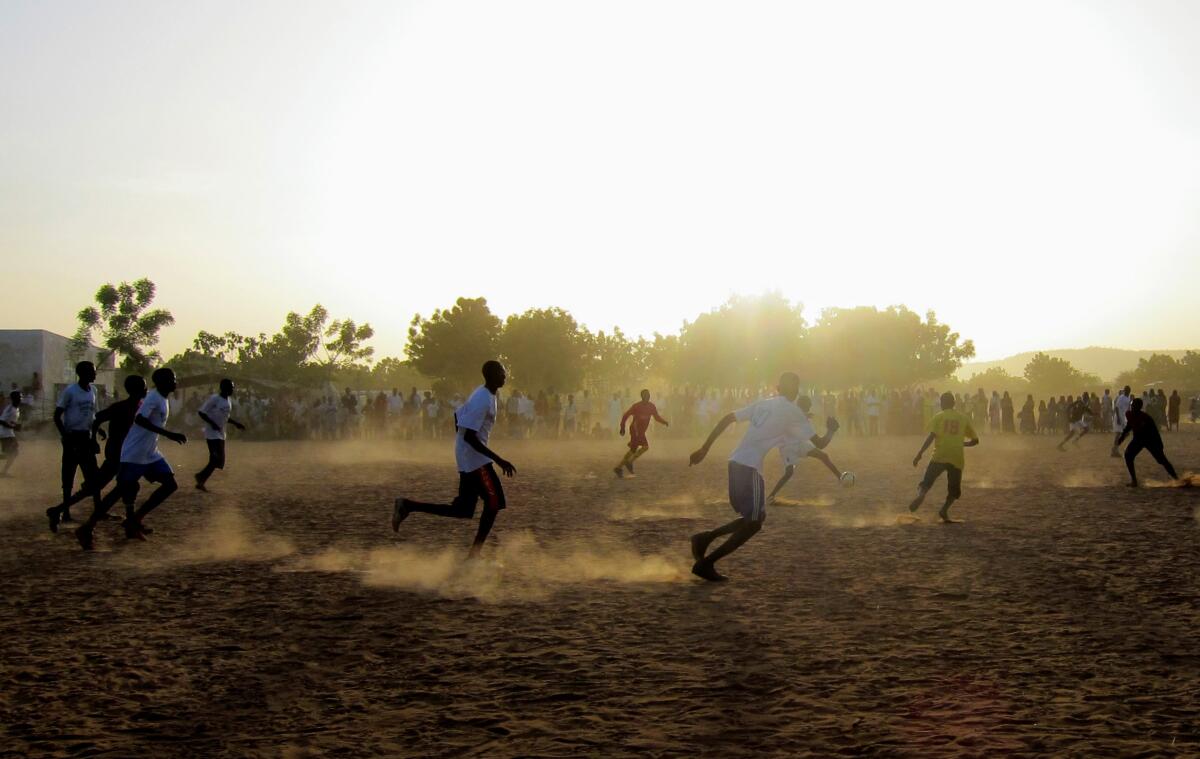 Athletes try out for the first Darfur United men's team roster at refugee camp in 2012