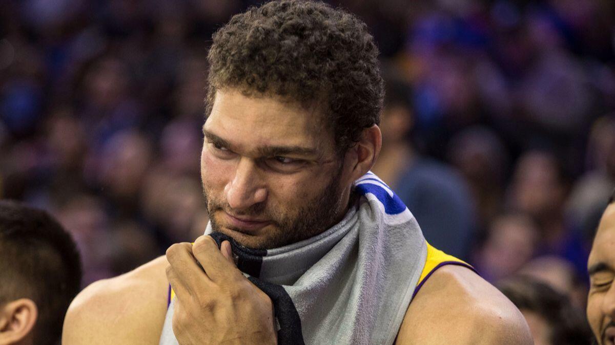 Lakers' Brook Lopez looks on from the bench during the second half against the Philadelphia 76ers on Thursday.