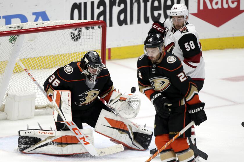 Anaheim Ducks goaltender John Gibson misses the puck on a goal by Arizona Coyotes defenseman Jakob Chychrun.