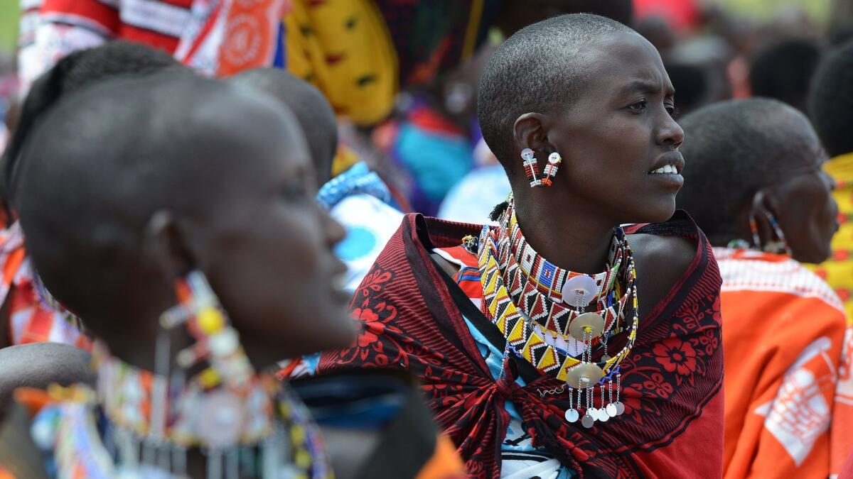 Female genital mutilation remains a deeply embedded practice in some cultures. These Kenyan Masai women attended a meeting in 2014 where several participants voiced opposition to a ban on the practice.