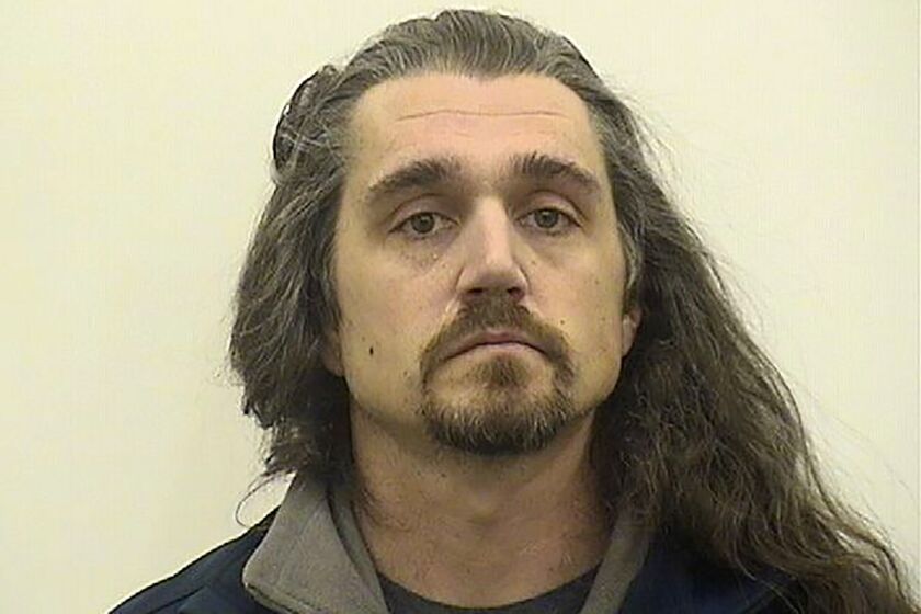 This booking image provided by Adams County, Illl., administration, shows Timothy Bliefnick of Quincy, Ill., who has been charged charged with first-degree murder in the death of his estranged wife, Rebecca Bliefnick. Bliefnick, 39, who once appeared on an episode of the television game show "Family Feud", pleaded not guilty Friday afternoon, March 24, 2023, at his arraignment in Adams County Circuit Court in Quincy, Ill. (Adams County, Illl., Administration via AP)