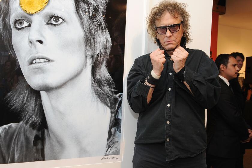 LOS ANGELES, CA - SEPTEMBER 09: Photographer Mick Rock attends the TASCHEN Gallery opening reception for "Mick Rock: Shooting For Stardust - The Rise Of David Bowie & Co." at TASCHEN Gallery on September 9, 2015 in Los Angeles, California. (Photo by Angela Weiss/Getty Images)