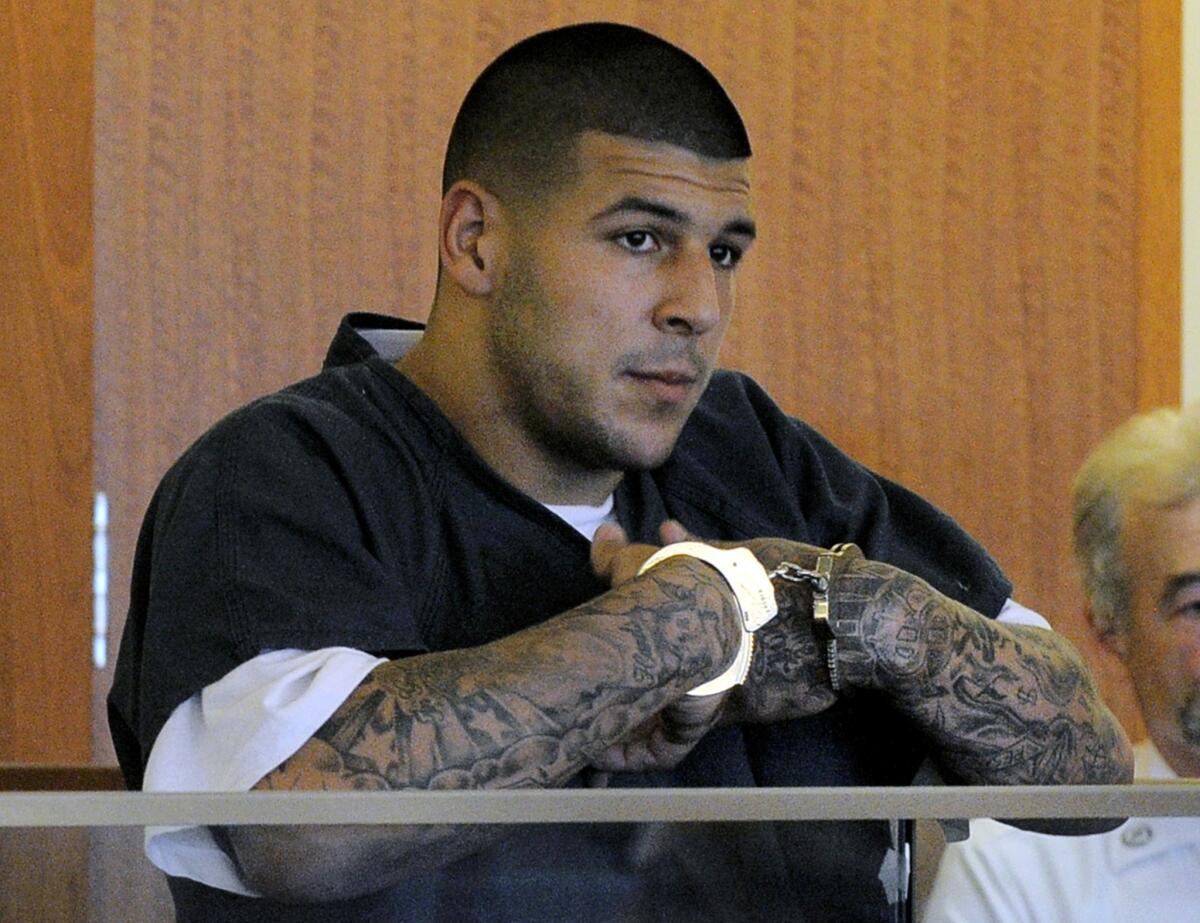 Former New England tight end Aaron Hernandez stands during a bail hearing in Fall River (Mass.) Superior Court last month.