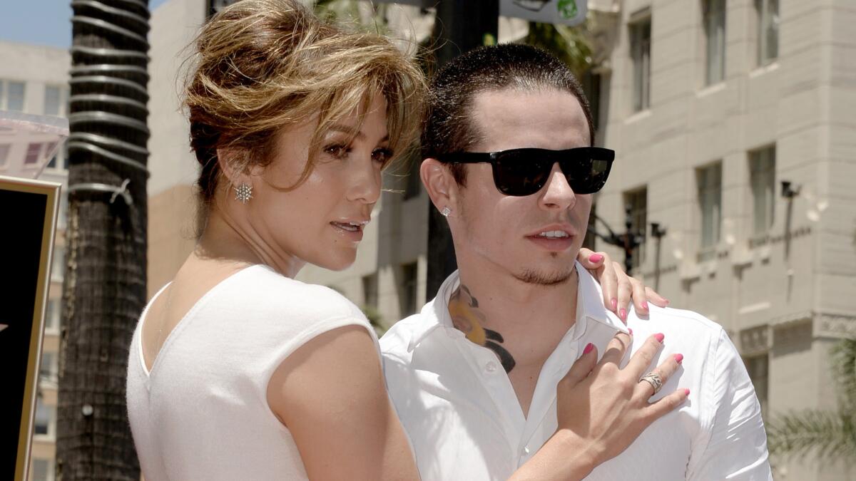 Actress/singer Jennifer Lopez and choreographer Casper Smart, shown in 2013, are reportedly dating again.