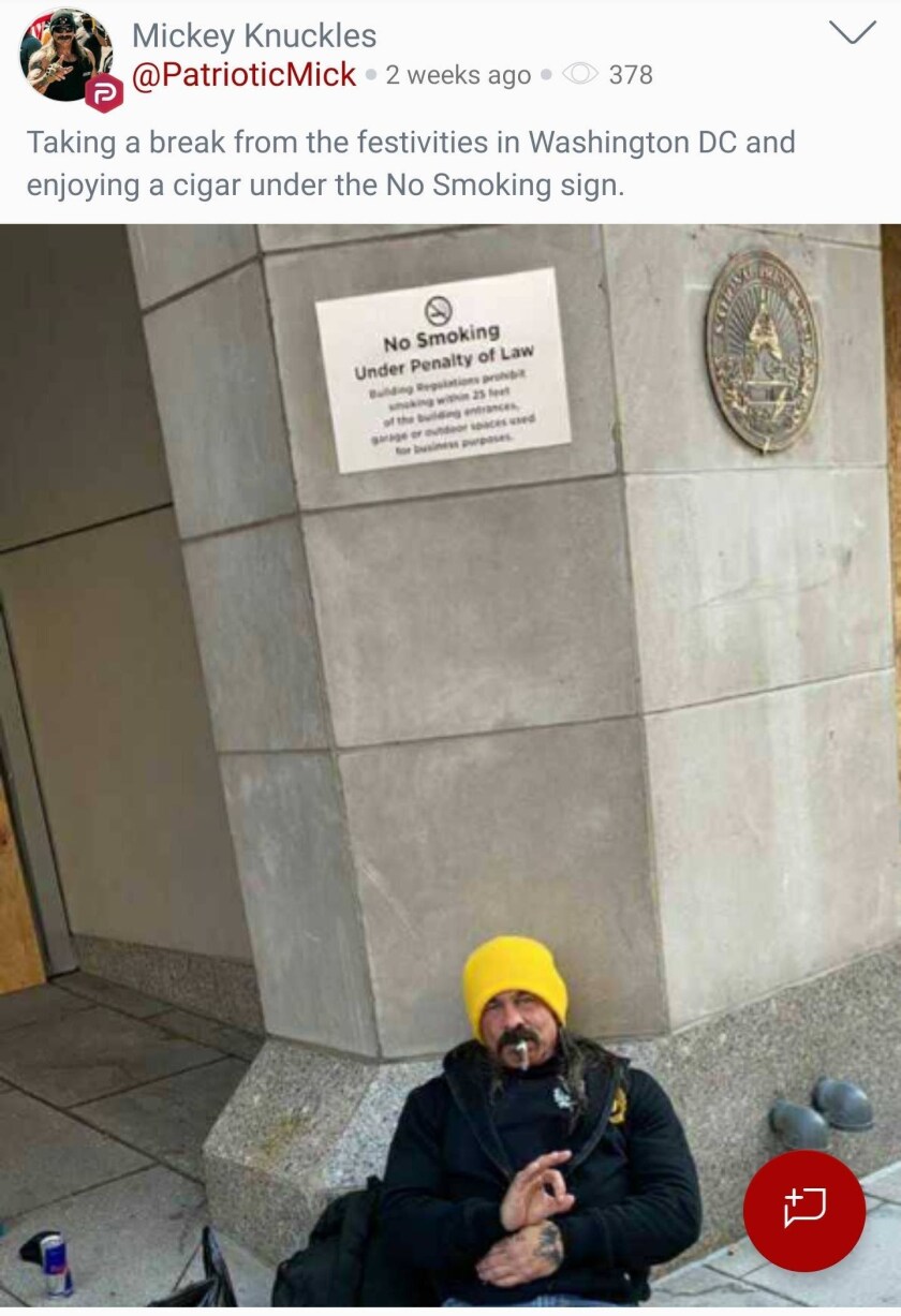 In this photo shared on Parler, Michael Sobczak is seen wearing a black jacket with the yellow Proud Boys logo.