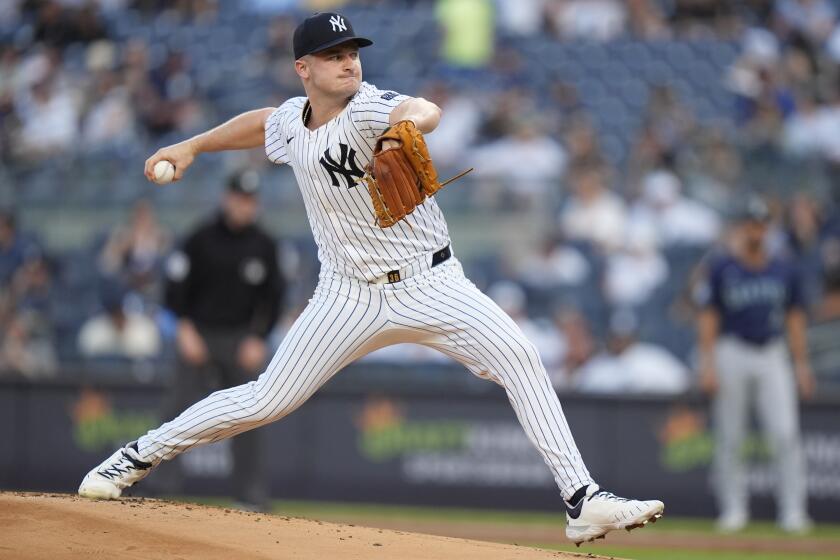 New York Yankees' Clarke Schmidt pitches during the first inning of a baseball game against the Seattle Mariners, Tuesday, May 21, 2024, in New York. (AP Photo/Frank Franklin II)