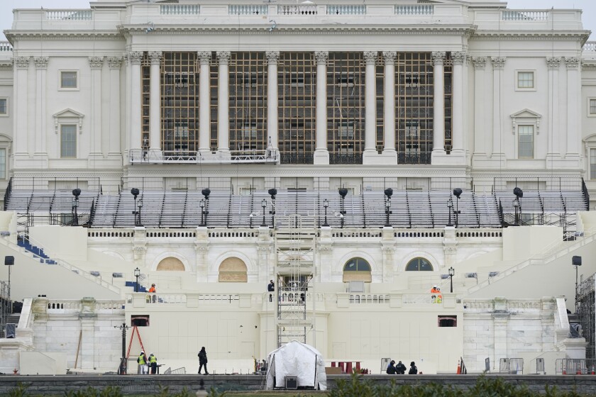 Preparations take place for President-elect Joe Biden's inauguration on the West Front of the U.S. Capitol in Washington, Friday, Jan. 8, 2021, after supporters of President Donald Trump stormed the building. (AP Photo/Patrick Semansky)