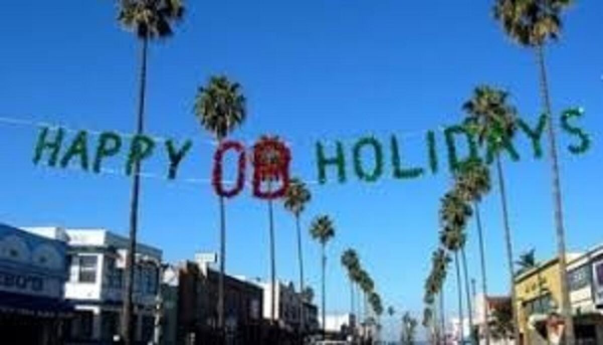 Holiday banners decorate Newport Avenue and Sunset Cliffs Boulevard in Ocean Beach.