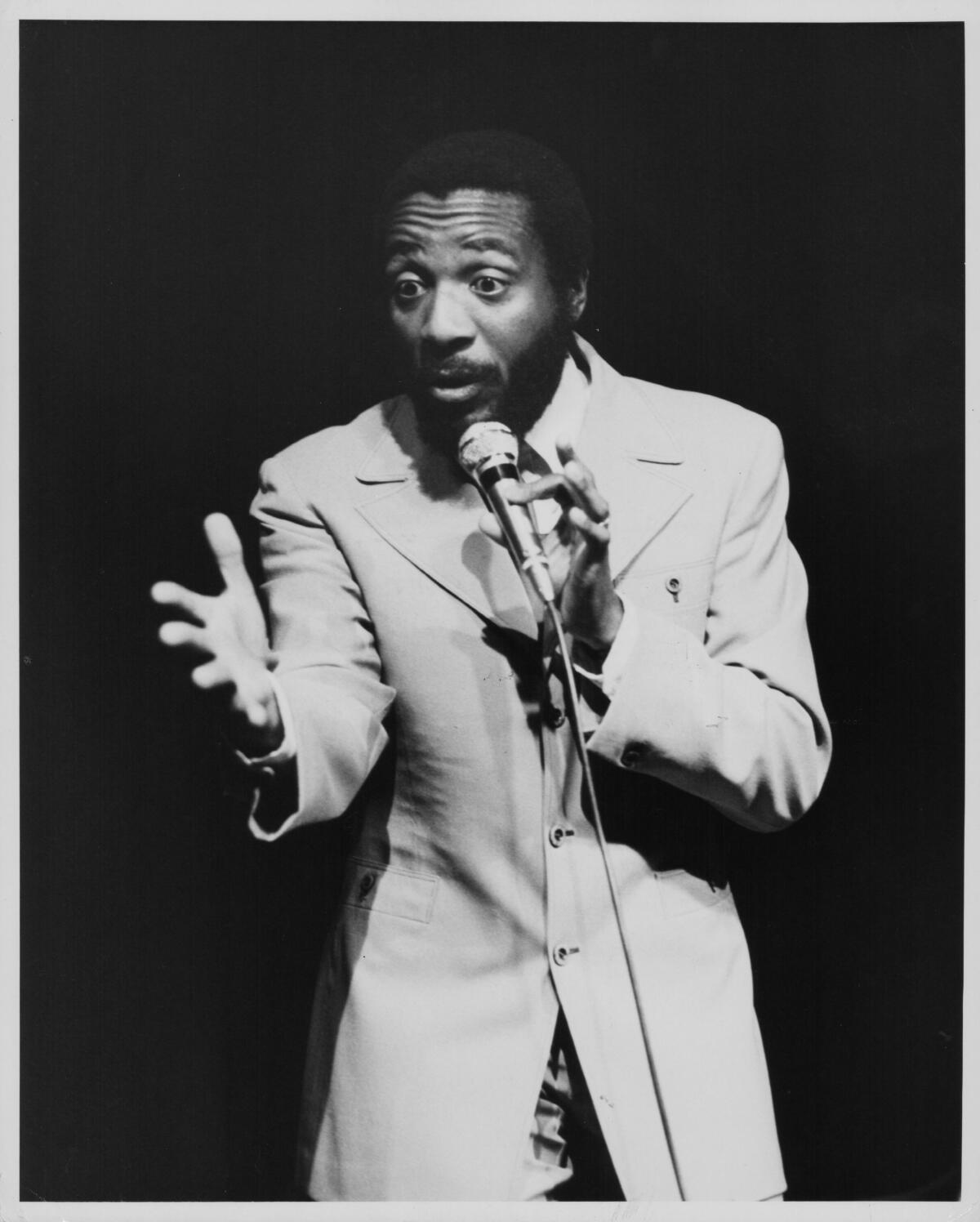 Comedian Dick Gregory onstage in the 1960s. 