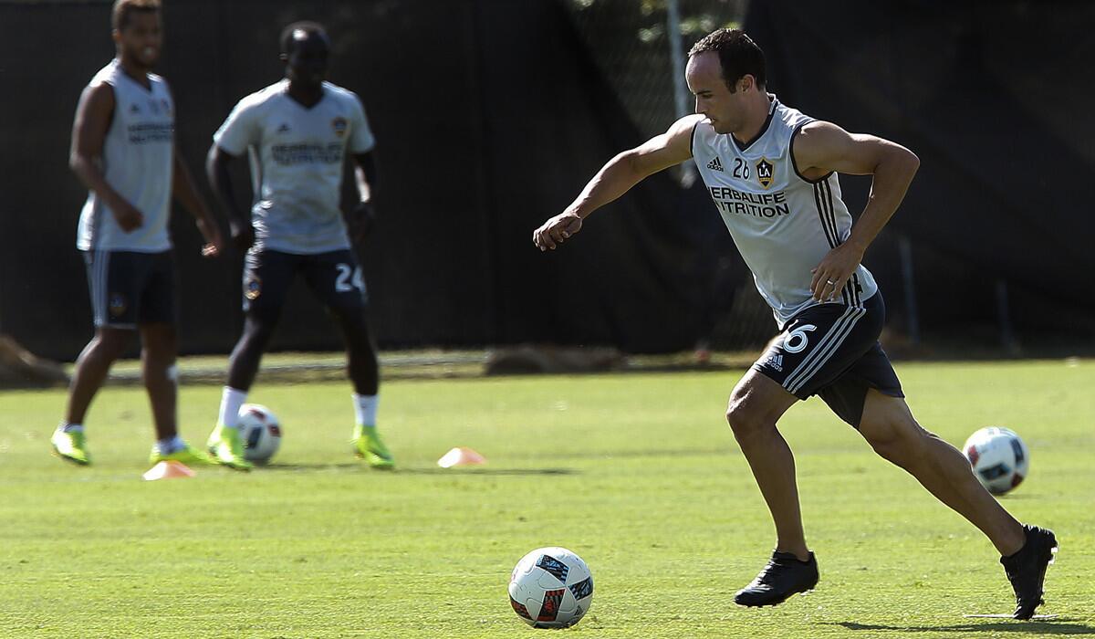 Landon Donovan takes part in a practice session at StubHub Center's University Field in Carson Friday.