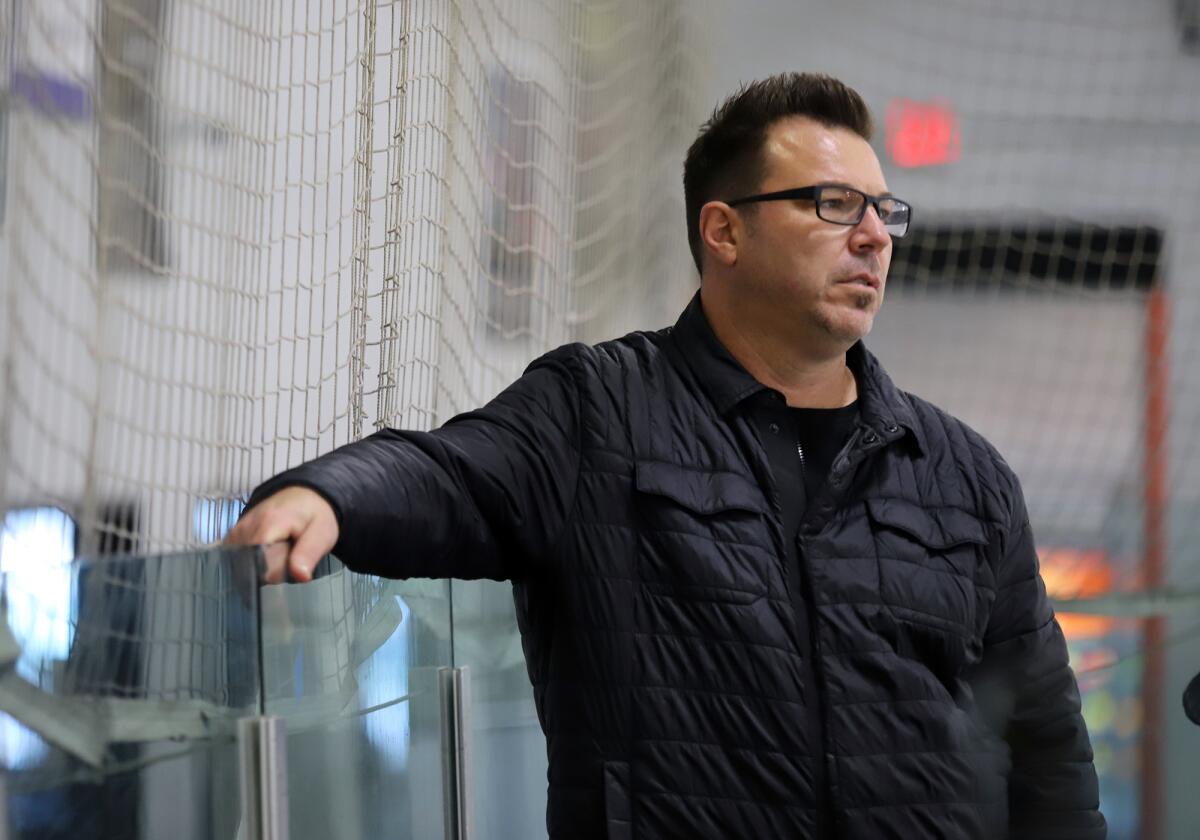 Beach Cities coach Dan Maxwell watches his team during a game against Edison at the Rinks Lakewood Ice on Sept. 24.