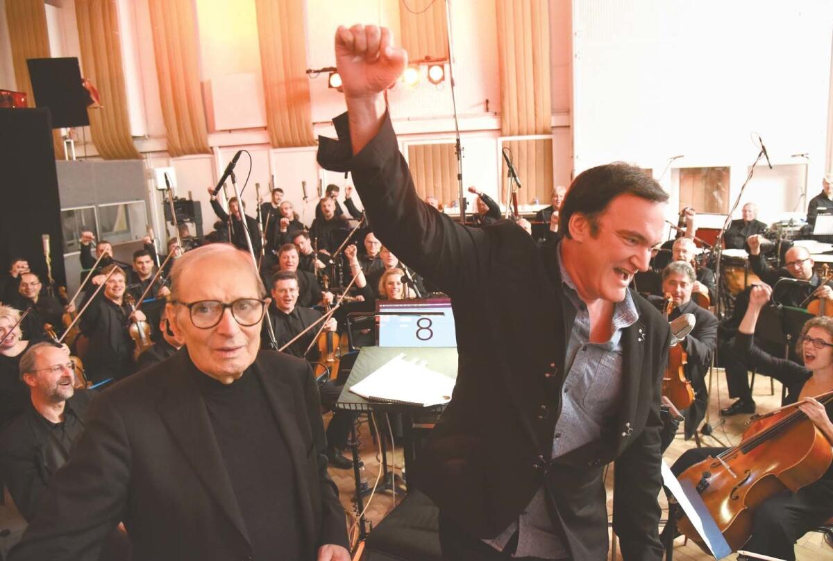 Ennio Morricone, left, and Quentin Tarantino at a 2015 London recording of the soundtrack to "The Hateful Eight."
