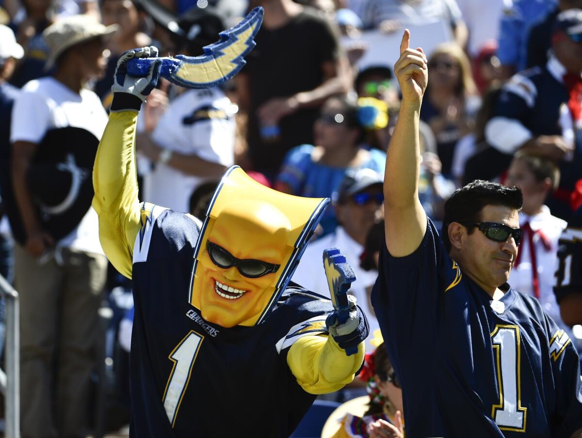 Fans cheer the San Diego Chargers during their home game Sunday against the Jacksonville Jaguars.
