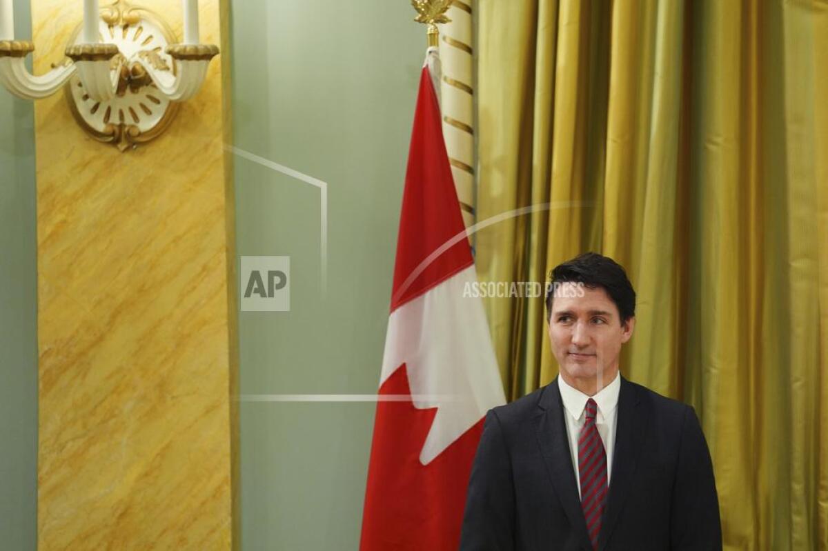 Prime Minister Justin Trudeau looks on during a Cabinet swearing-in ceremony