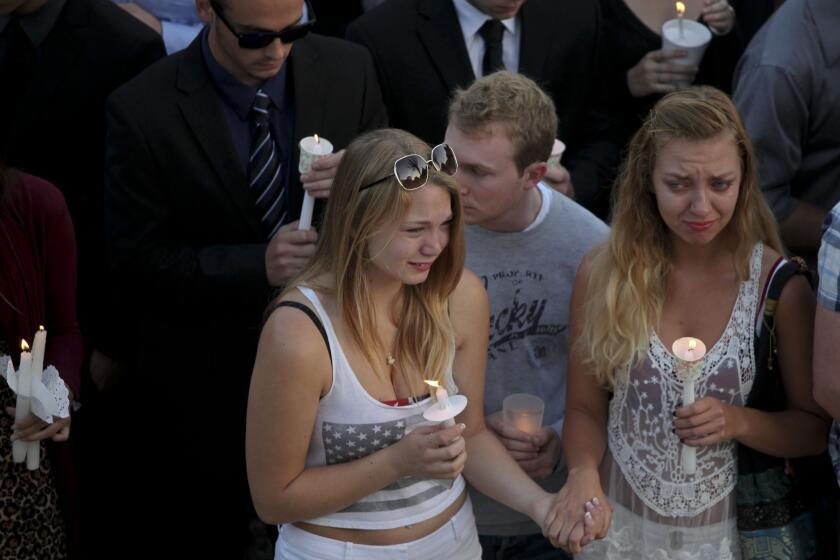 Hundreds turned out Saturday for a vigil at UC Santa Barbara to remember the victims killed in Friday's rampage.
