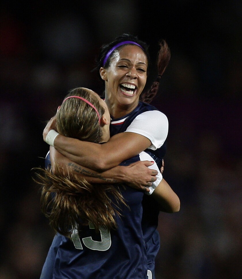 American Sydney Leroux celebrates with Alex Morgan following their semifinal win over Canada at the 2012 London Olympics 