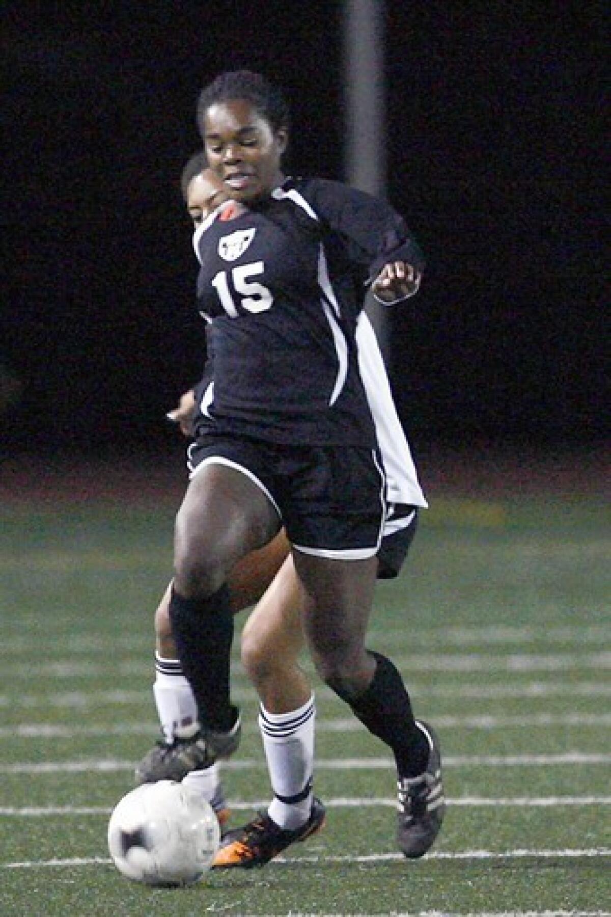 FILE PHOTO: Flintridge Sacred Heart Academy's Kayla Mills takes possession of the ball during a game against South Pasadena at South Pasadena High School on Thursday, December 13, 2012.