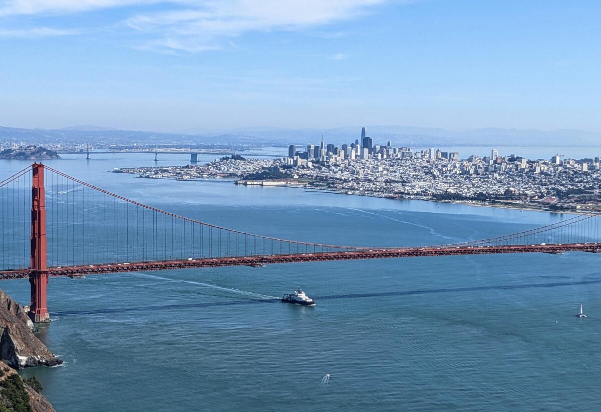 A view of the San Francisco skyline between the Golden Gate and Bay bridges.