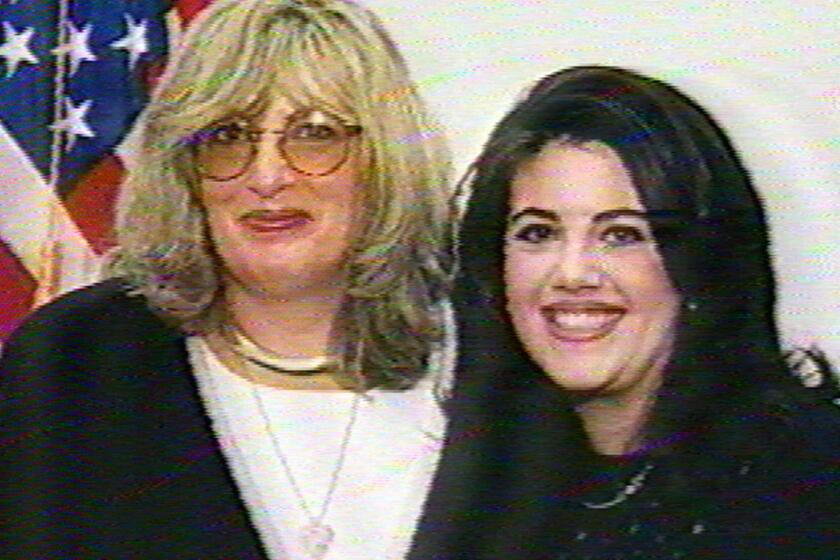 Former White House intern Monica Lewinsky, right, is shown with former White House aide Linda Tripp in an undated handout photo in this image taken from television on Jan. 27, 1998.