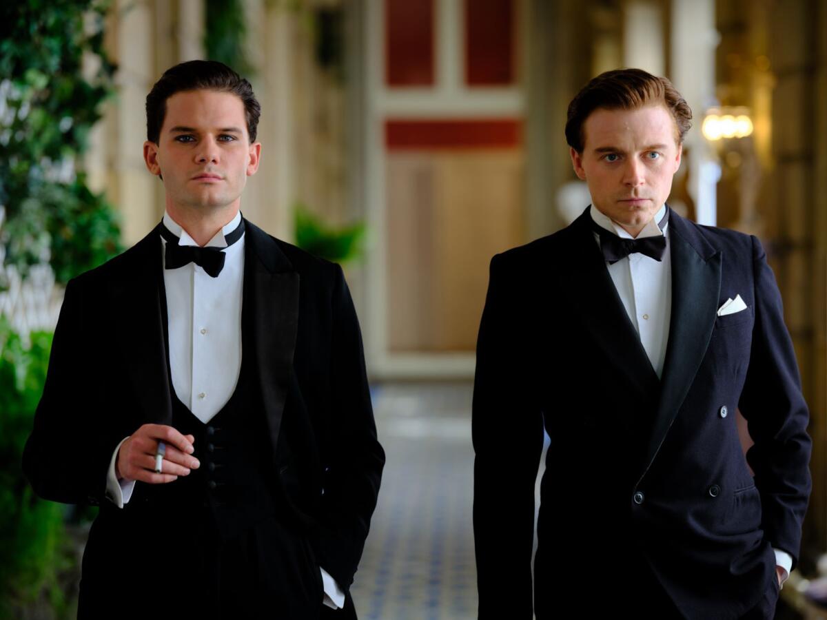 Jeremy Irvine and Jack Lowden wearing tuxedos in “Benediction” (2022).