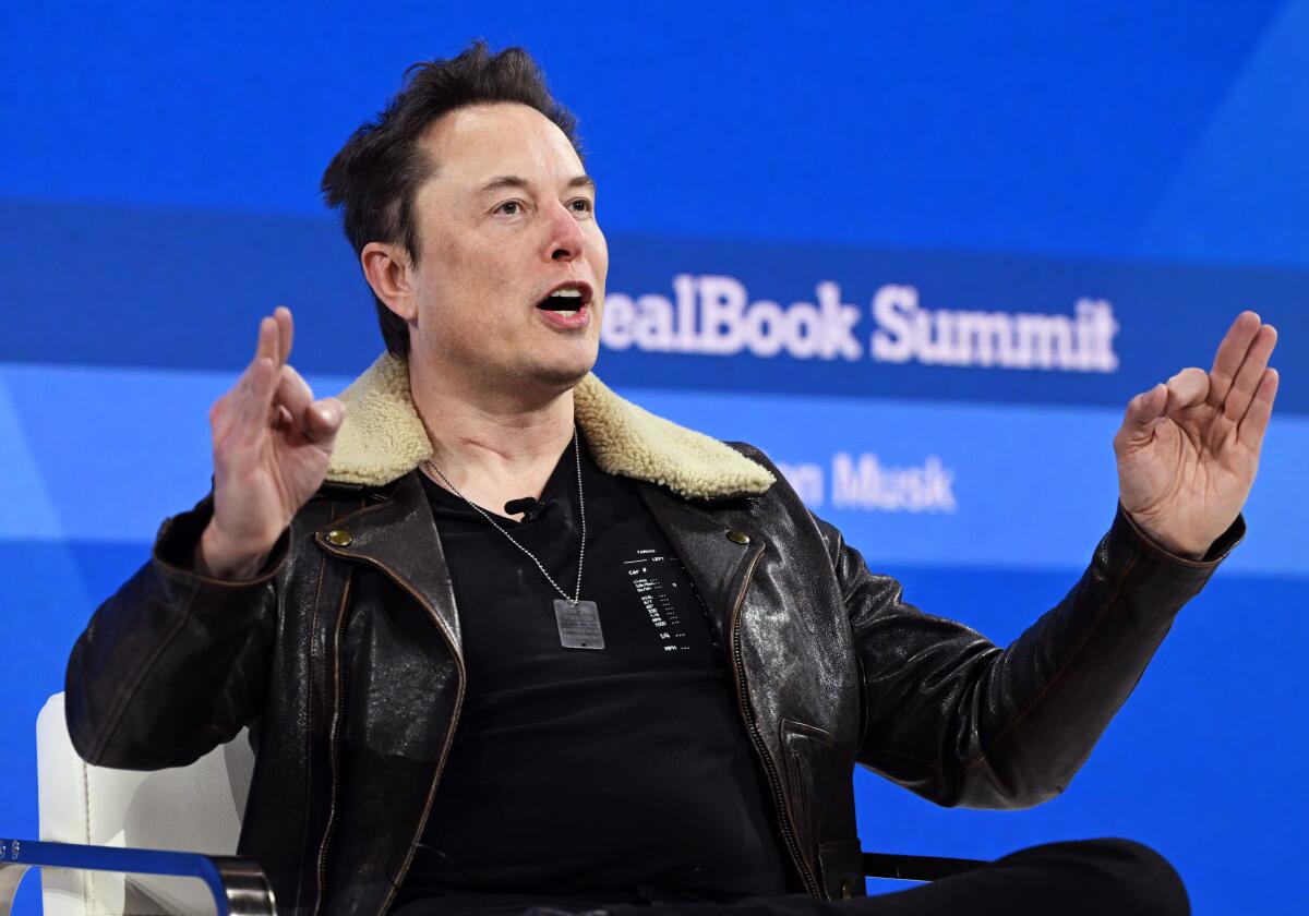 Elon Musk speaking at the New York Times DealBook Summit