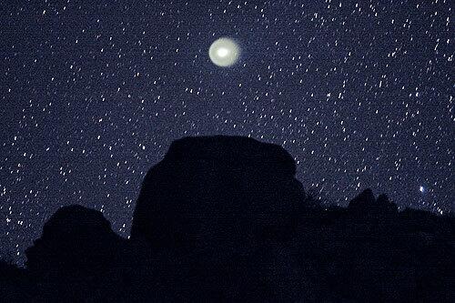 Comet Holmes rises in the N.E. sky above Coyote Canyon in Anza Borrego Desert State Park. It's visible to the naked eye and better seen with binoculars. Discovered in the late 19th Century, Holmes has become dramatically brighter in the past 2 weeks.