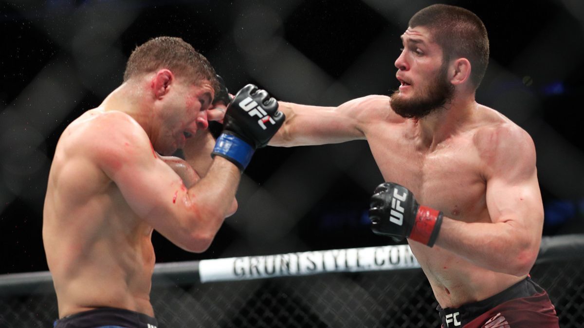Khabib Nurmagomedov, right, lands a right hand to the head of Al Iaquinta during their UFC lightweight championship bout at UFC 223 on Saturday in New York.