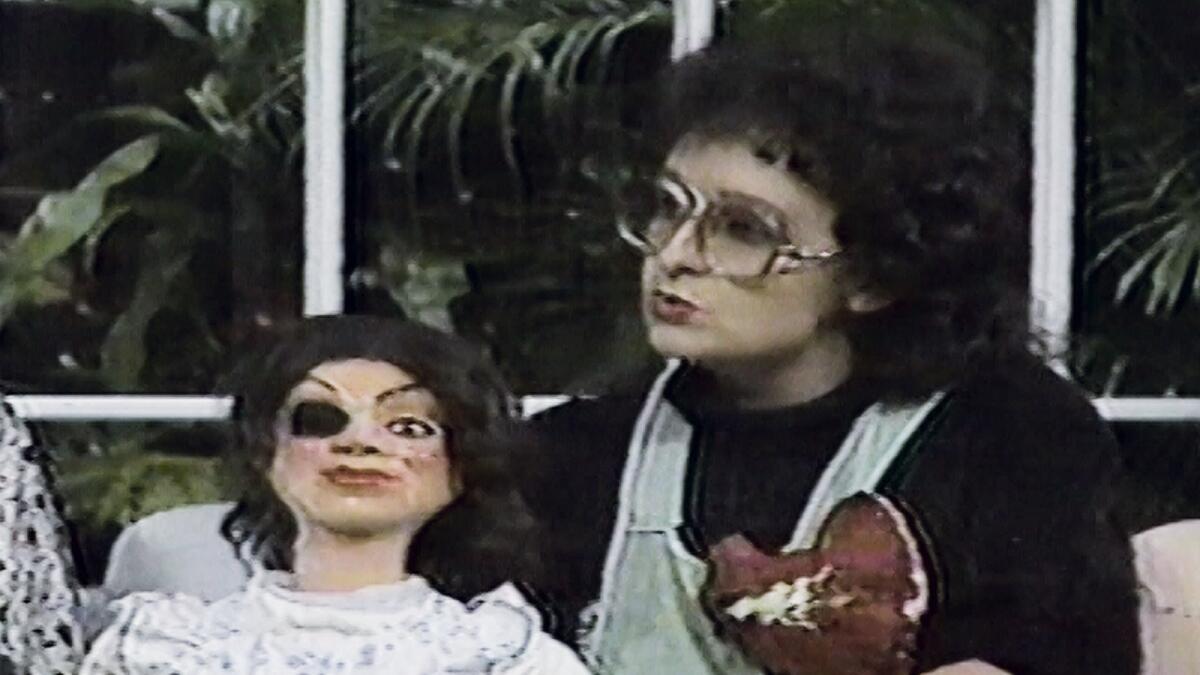 A video still shows Mónica Mayer on the television show hosted by Guillermo Ochoa as part of the performance "Madre por un día" (Mother for a day), from 1987. Mayer's work is part of "Radical Women." (Collection of Monica Mayer and Victor Lerma)
