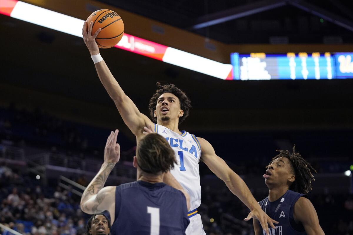 UCLA's Jules Bernard leaps for the ball.