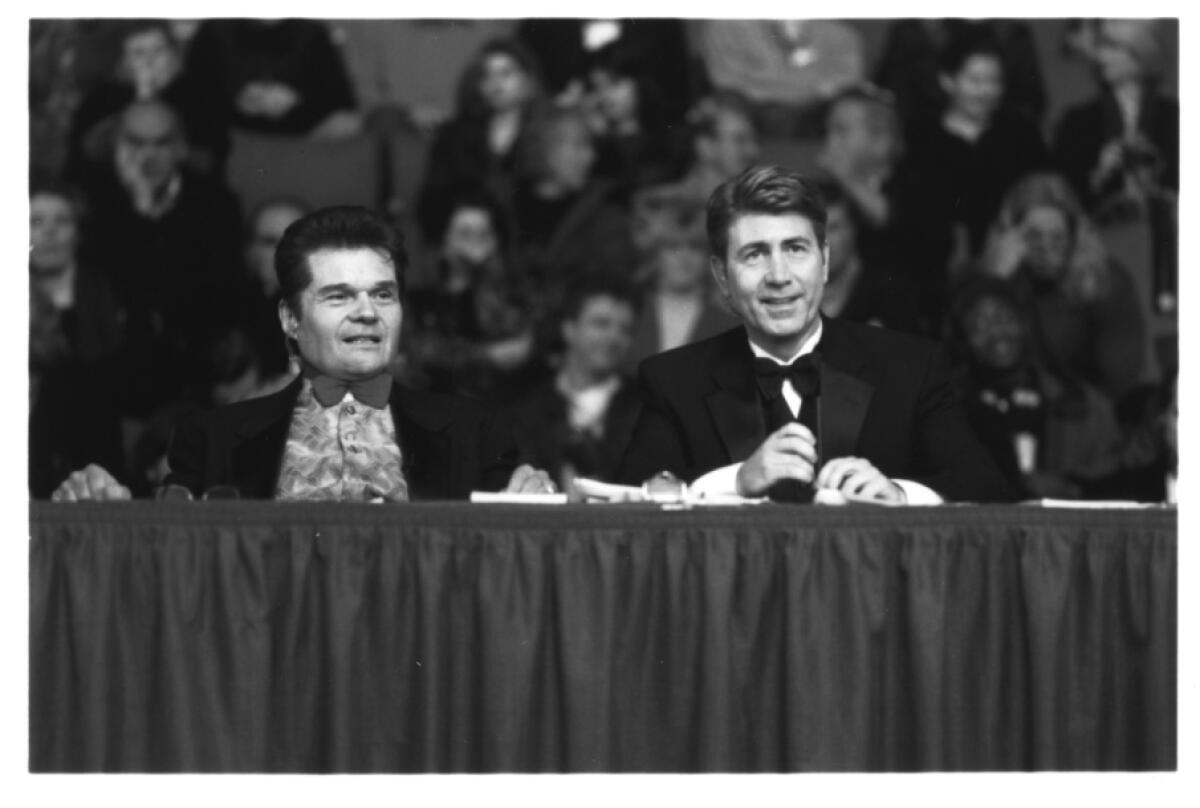Fred Willard, left, and Jim Piddock in "Best in Show" as Mayflower Kennel Club dog show commentators.