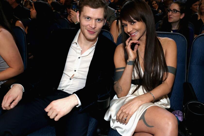 "The Originals" star Joseph Morgan is engaged to "The Vampire Diaries" actress Persia White. The couple is seen here at the 40th People's Choice Awards at L.A. Live on Jan. 8.