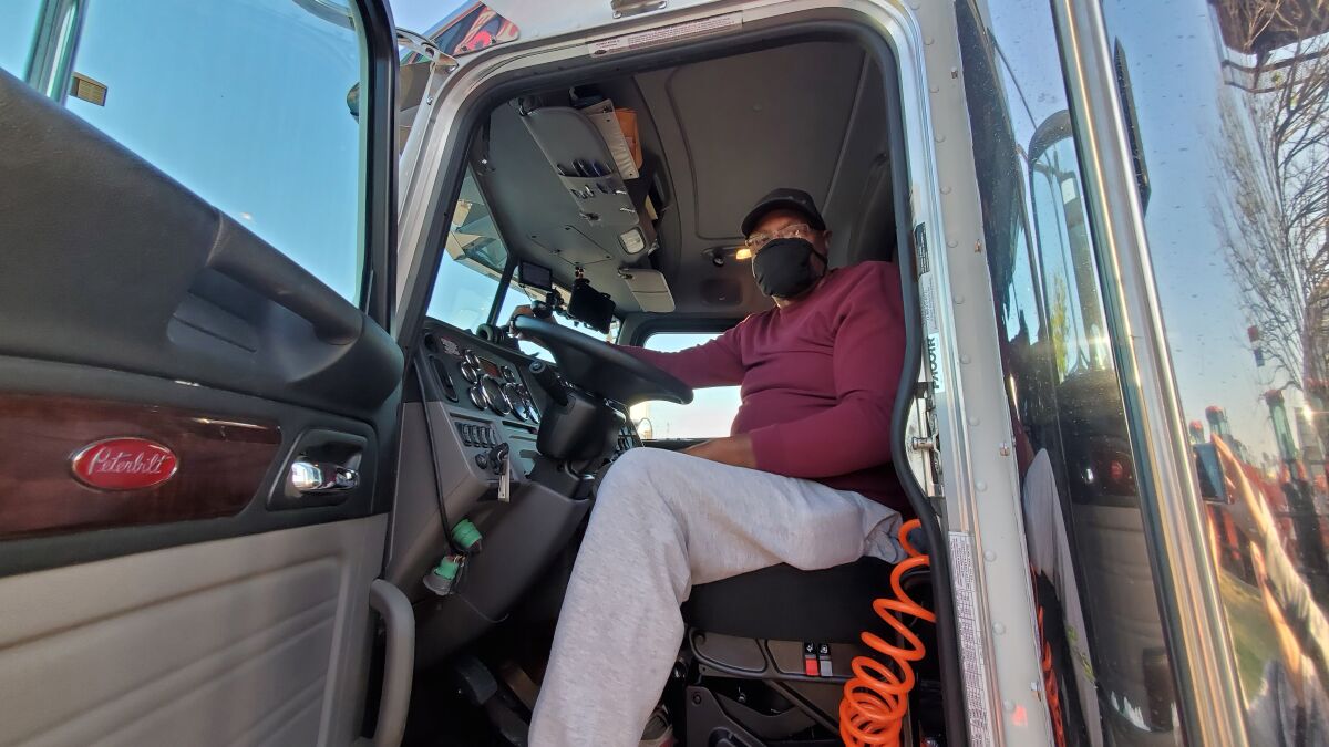 Trucker Andrew Williams of Houston said that outside of essential goods, "it's hard to find freight now." He said his company was "struggling to keep me working."