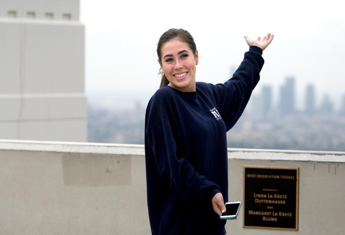 Guest Taylor Kenney had a view of downtown Los Angeles from the Griffith Observatory during a three-hour, Red Carpet tour offered by Burbank-based Sunnyday Scoot on Friday, June 5, 2015.