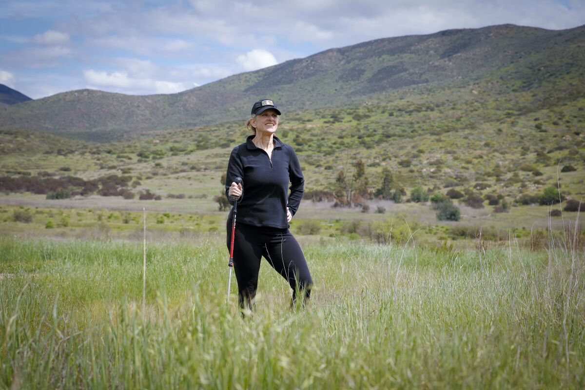 Jamie Gold sets off on one of her weekly hikes in the hills east of Chula Vista.