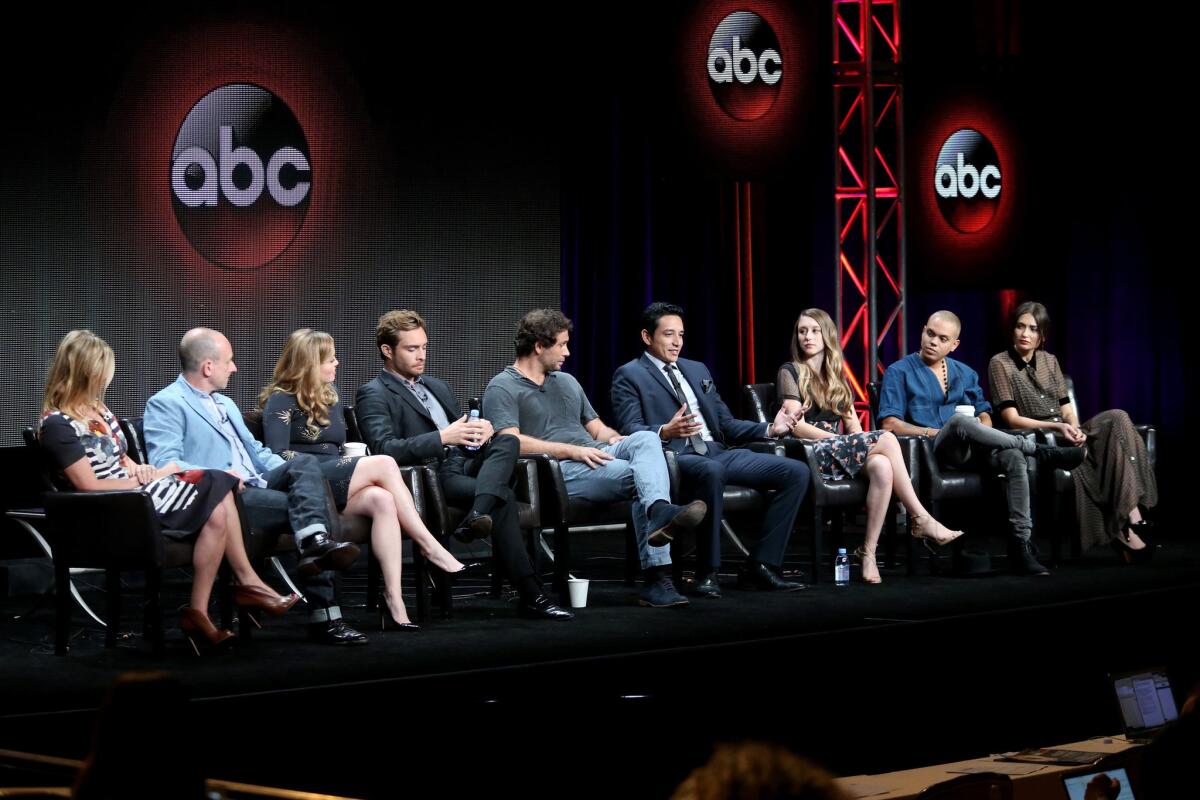 The "Wicked City" team at TCA on Tuesday: From left, executive producers Amy B. Harris and Steven Baigelman and actors Erika Christensen, Ed Westwick, Jeremy Sisto, Gabriel Luna, Taissa Farmiga, Evan Ross and Karolina Wydra.