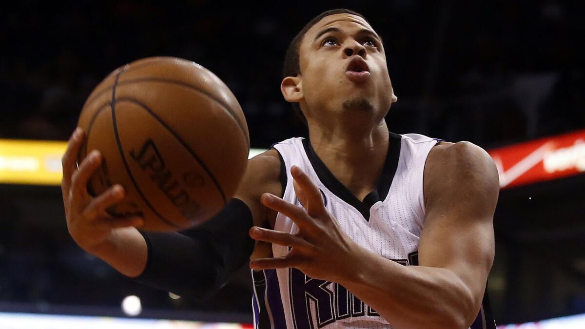 Sacramento Kings point guard Ray McCallum puts up a shot during a game against the Phoenix Suns on March 25.