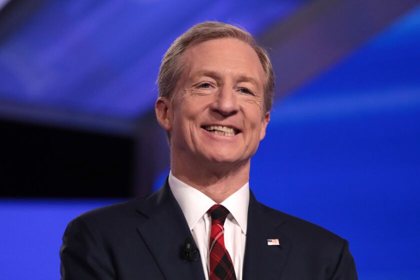 CHARLESTON, SOUTH CAROLINA - FEBRUARY 25: Democratic presidential candidate Tom Steyer arrives on stage for the Democratic presidential primary debate at the Charleston Gaillard Center on February 25, 2020 in Charleston, South Carolina. Seven candidates qualified for the debate, hosted by CBS News and Congressional Black Caucus Institute. (Photo by Scott Olson/Getty Images)