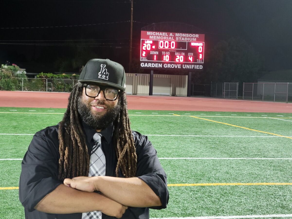 Los Amigos football coach Romel Guess, pictured after his first win in 2021 against Ocean View.