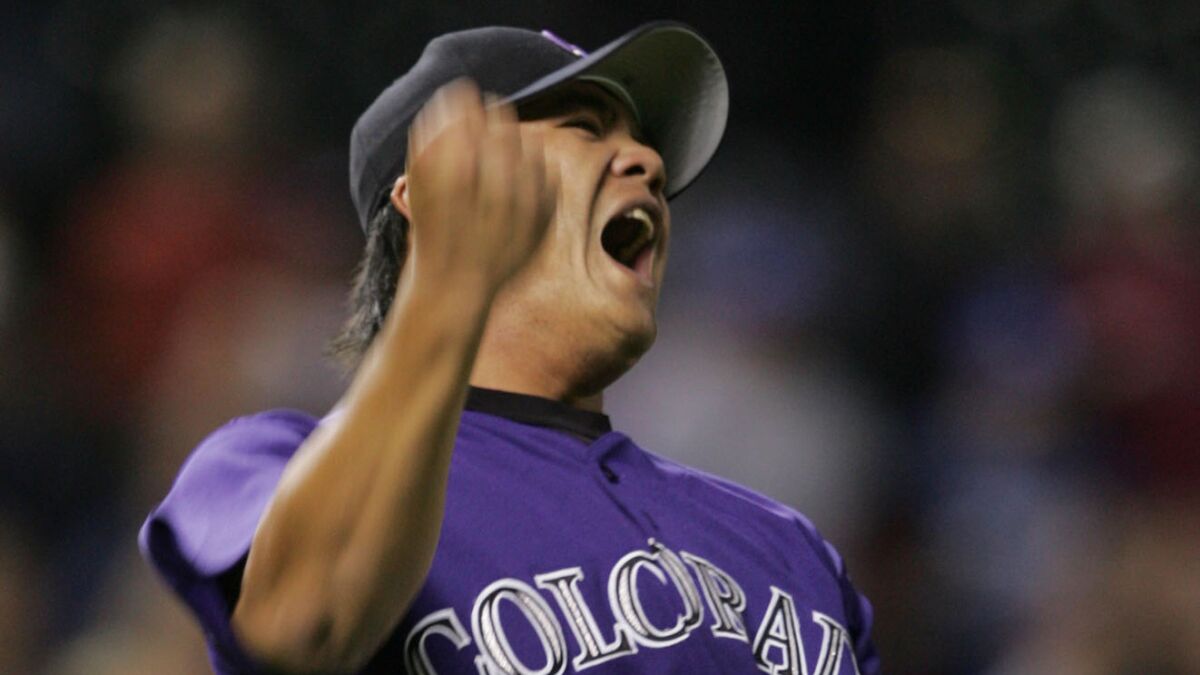 Reliever Chin-hui Tsao, pitching for the Colorado Rockies in April 2005, celebrates the final out in a game against the Dodgers in Denver.